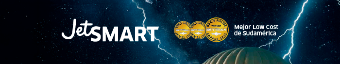 JetSMART logo with award badges labelled 'Best Low-Cost in South America', hot-air balloon and lightning backdrop