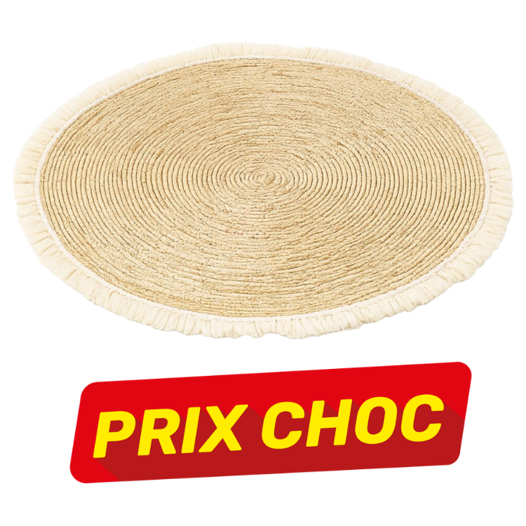 Round natural jute rug with fringed edge and spiral weave, boho floor mat pictured with red 'PRIX CHOC' sale label