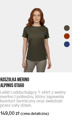 Front view of woman wearing olive green Alpinus Otago merino T-shirt, short sleeves, breathable fabric on white studio background