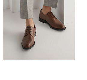 Sk&oacute;rzane p&oacute;łbuty męskie w kolorze koniaku