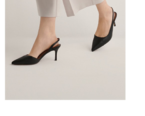 Czarne sk&oacute;rzane cz&oacute;łenka z wyciętą piętą