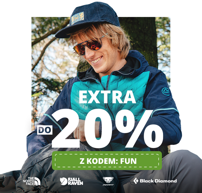 Smiling man in sunglasses and cap wearing a blue outdoor jacket sitting by a tree, overlay text 'Extra 20% - z kodem: FUN' with outdoor brand logos