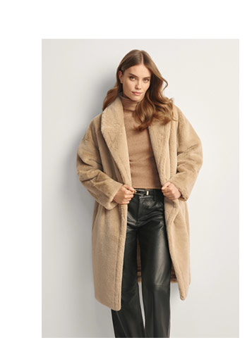 Długie beżowe futro damskie