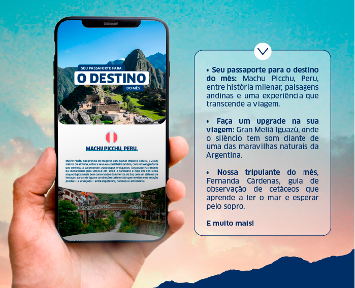 Hand holding smartphone displaying Machu Picchu, Peru travel guide beside a promotional travel tips panel
