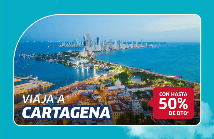 Aerial view of Cartagena, Colombia skyline and coastline at dusk with city lights — travel promotion offering up to 50% off