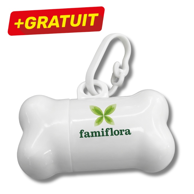 White bone-shaped dog waste bag dispenser with Famiflora green leaf logo and clip, promotional red 'GRATUIT' free label