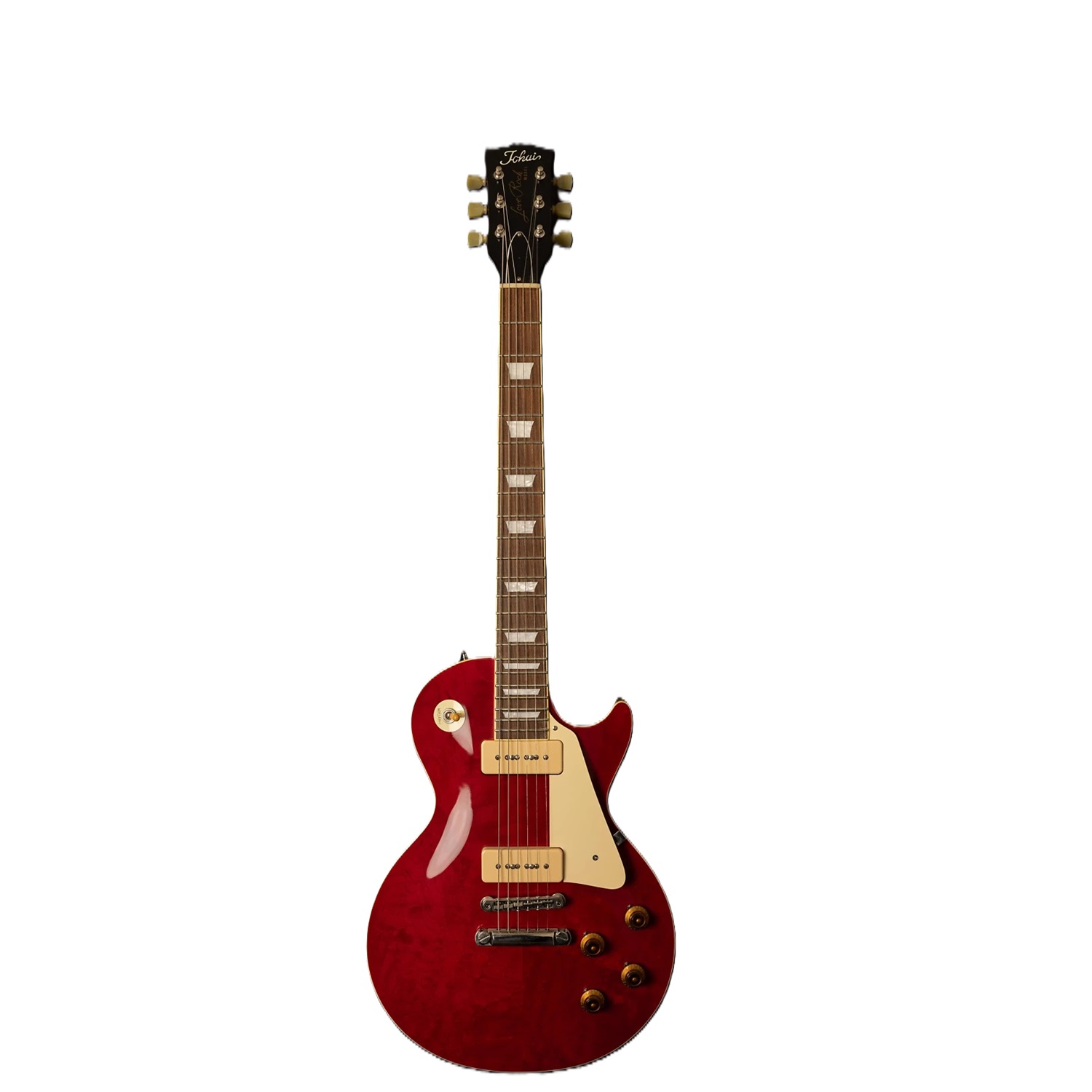 Red single-cutaway electric guitar with cream pickguard and two P-90 pickups, glossy finish on white background