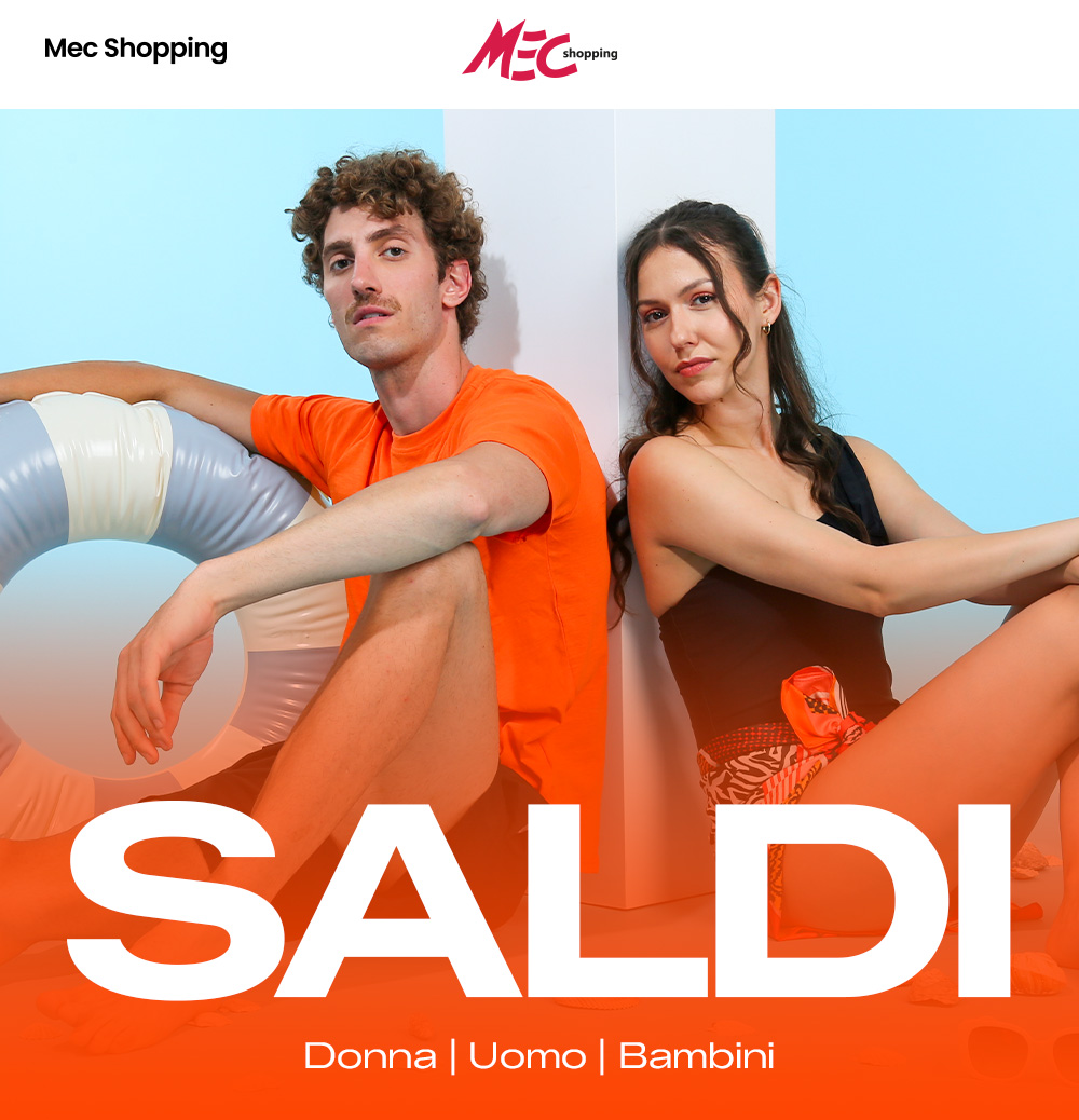 Two young models seated back-to-back by a pastel blue wall with an inflatable ring, wearing summer clothing and large 'SALDI' sale text